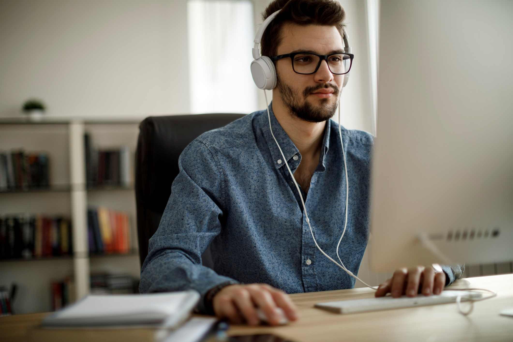 man doing research on computer