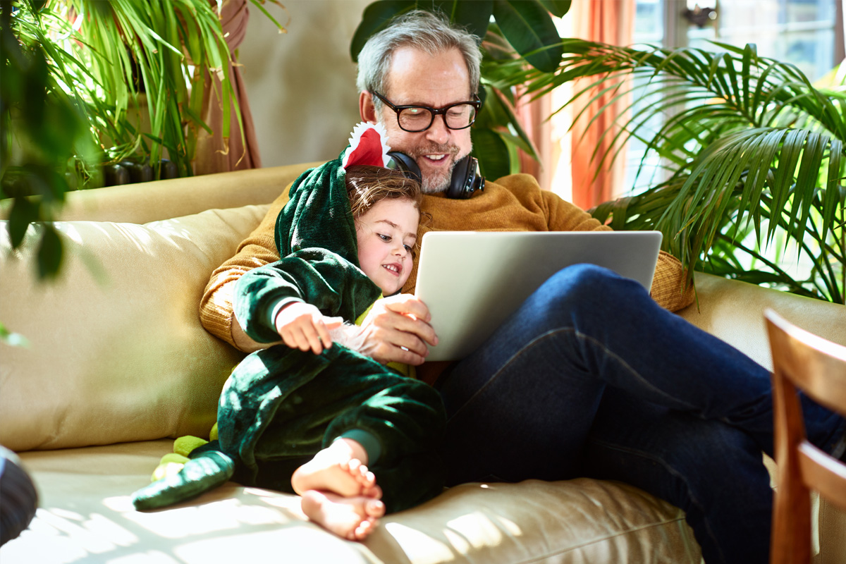 adult & child watching a movie