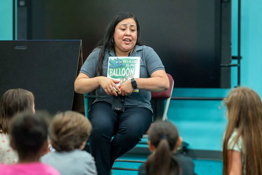 librarian reading to kids at storytime