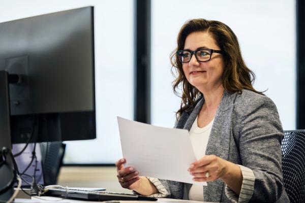 woman in tax collector's office
